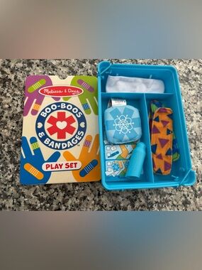 Melissa & Doug Blue Toy First-Aid Play Set with Bright Patterned Bandage